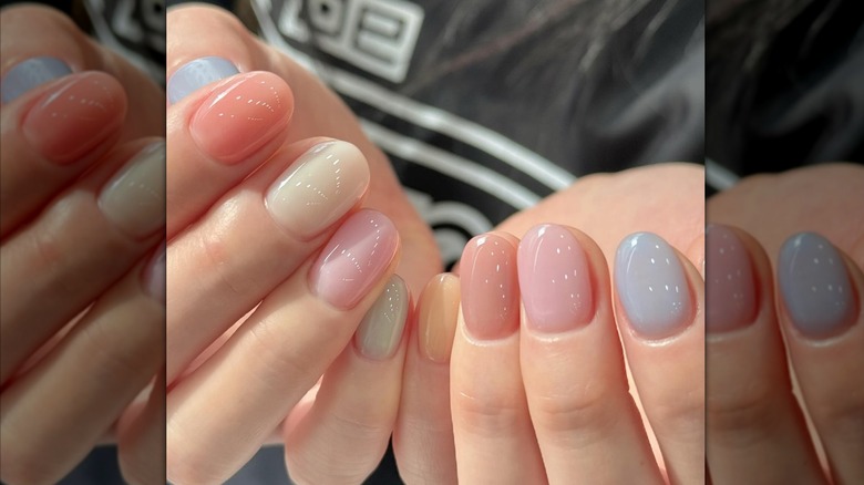 Woman with rainbow jelly nails