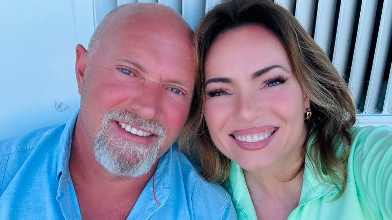 Jeff Lawrence and Lisa Robertson smile together in a selfie
