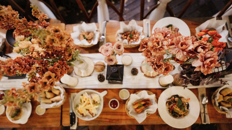 Table setting with food and flowers