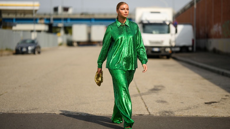 woman in green sequin outfit