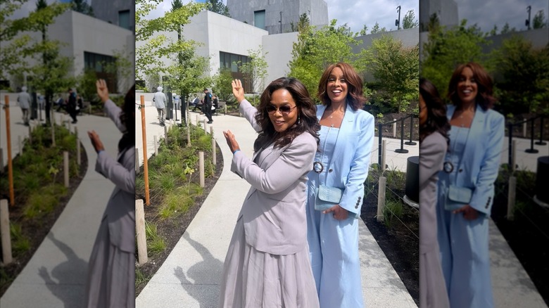 Oprah Winfrey and Gayle King pose outside of the Obama Presidential center