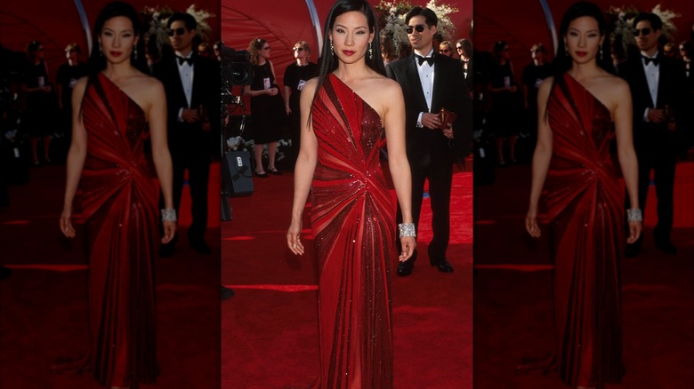 Lucy Liu at the 2000 Oscars in a red one-shoulder dress