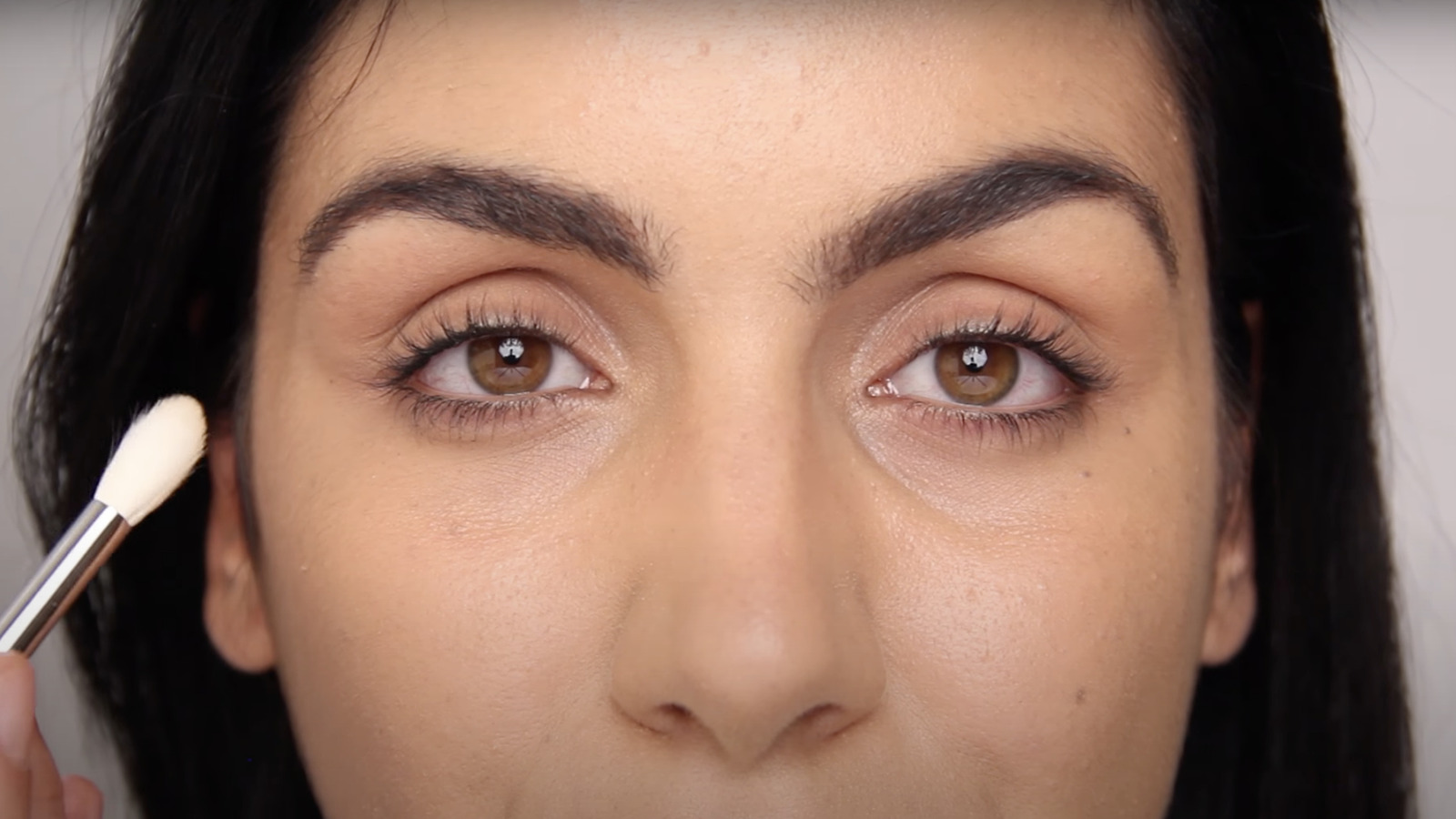 Our Best Tips For Applying Concealer To Brighten DeepSet Eyes