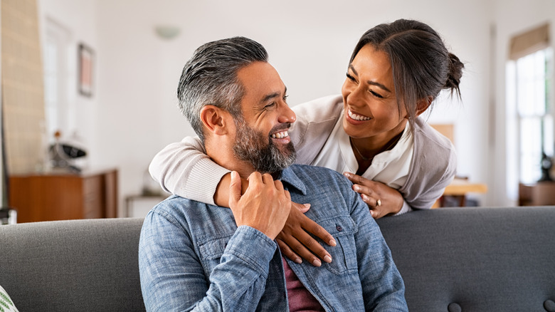 Man and woman holding hands