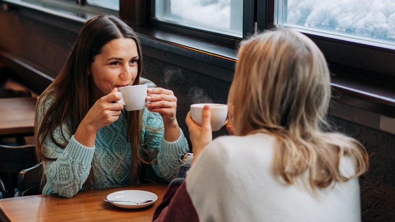 Women chatting over coffee