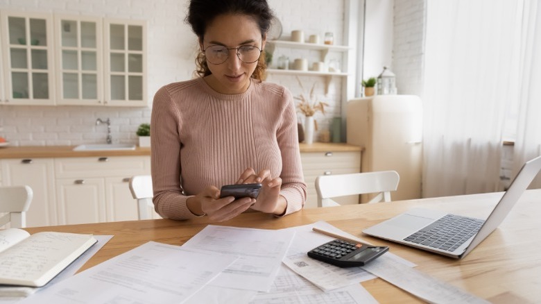 Woman paying her bills