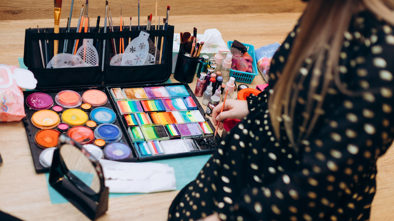 woman mixing makeup