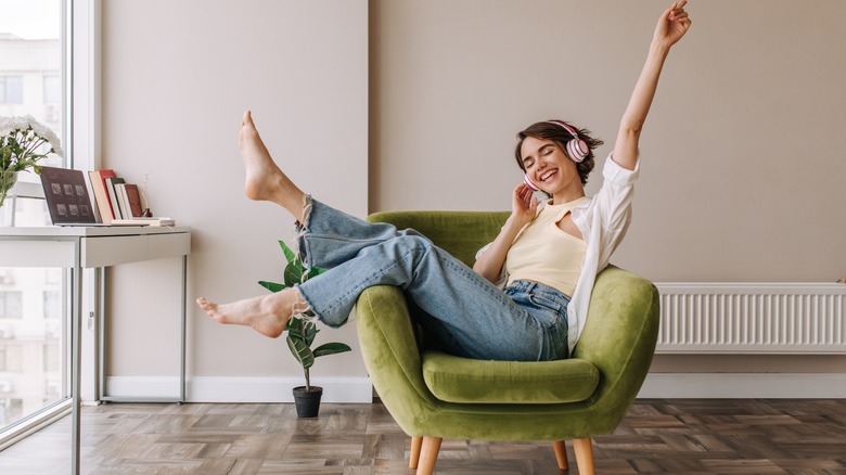 Woman in chair wearing jeans