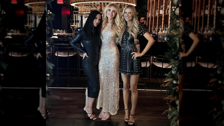 Christina Haack poses for a photo with two friends while out at a fancy bar