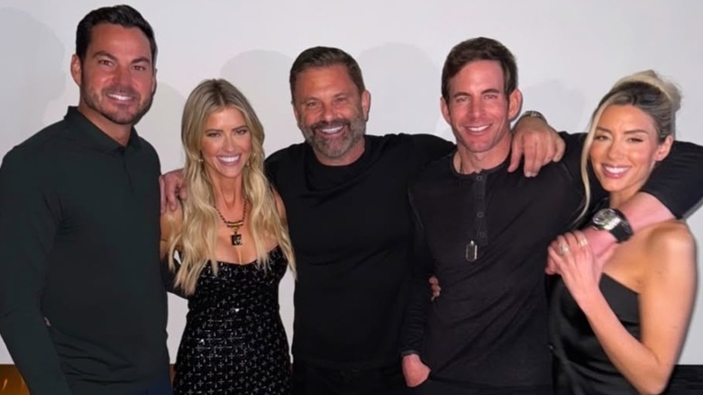 Christina Haack smiling in a black dress