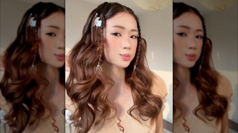 A woman with beachy, wavy hair featuring cutesy accessories