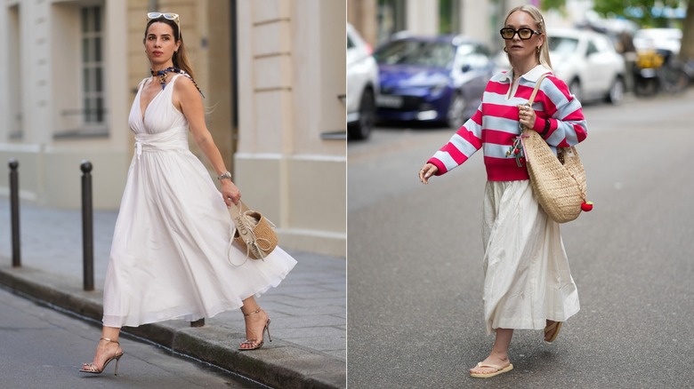A woman wears a long white dress and woven handbag.