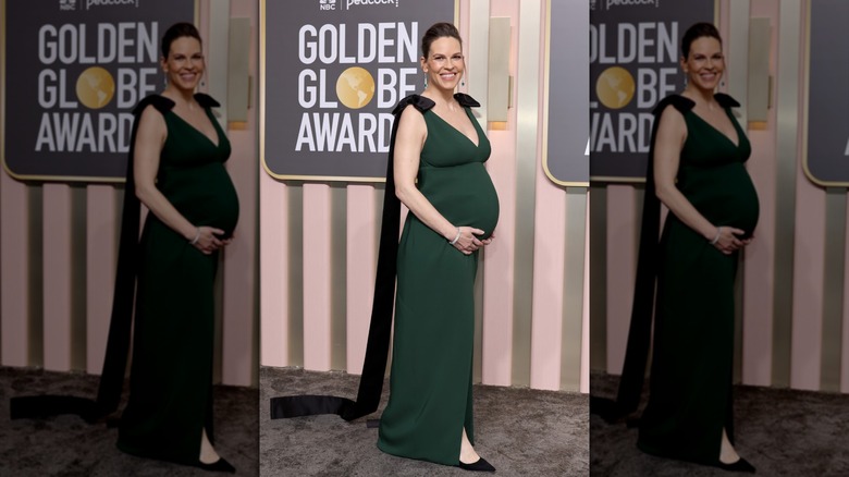 Hilary Swank wearing a stretchy gown at the golden Globes