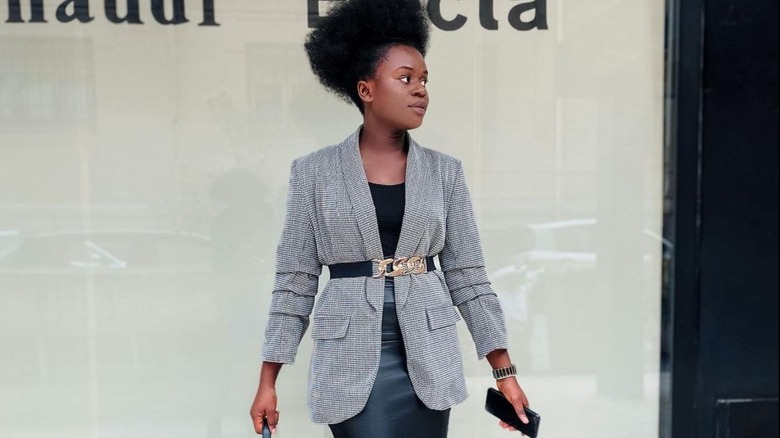 Gray blazer with black and gold belt