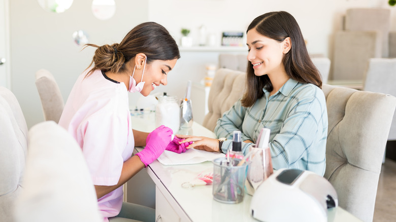 two women at nail salon