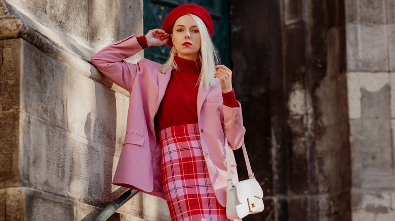 Woman wearing pink and red