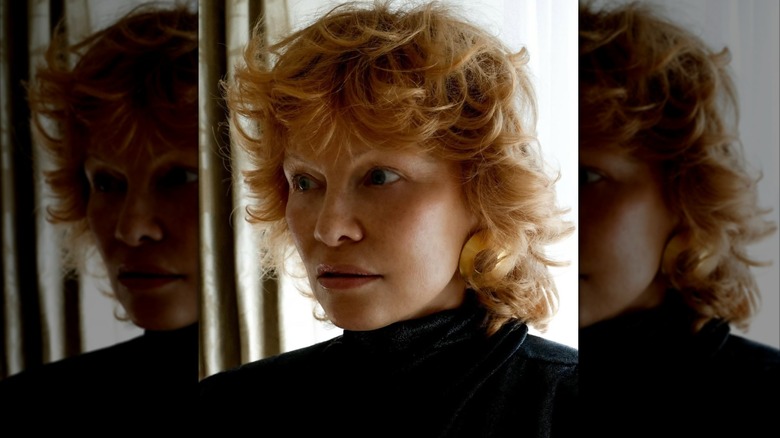 Pamela Anderson with red hair.
