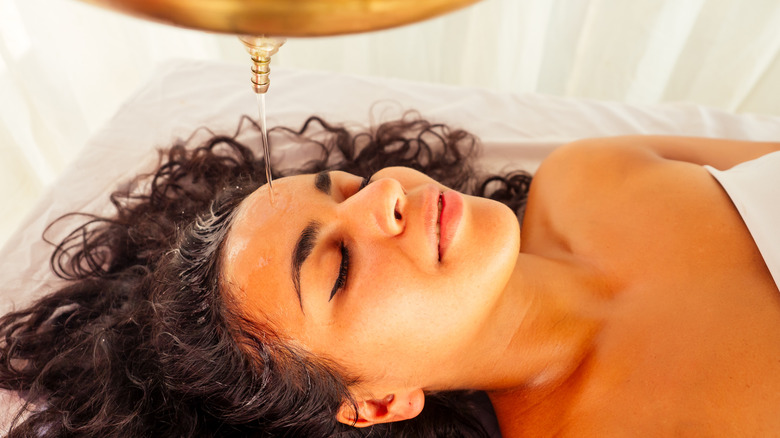 Woman undergoing panchakarma treatments