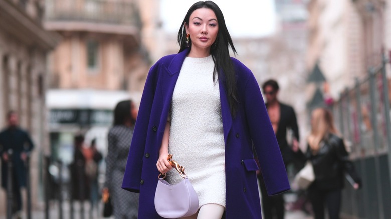 woman wearing a purple coat
