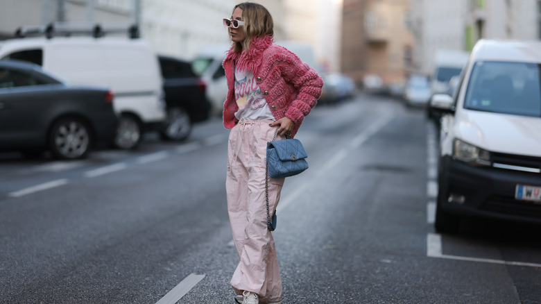 woman wearing parachute pants