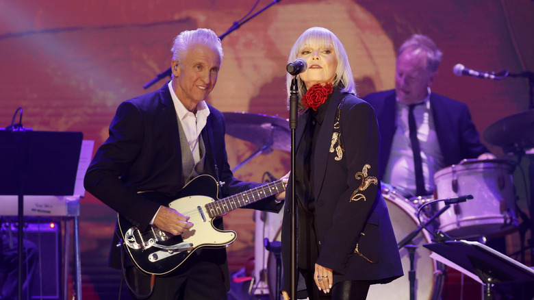 Neil Giraldo and Pat Benatar perform onstage during Walkin' After Midnight: The Music Of Patsy Cline