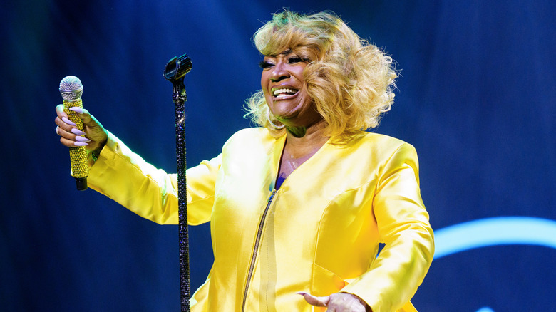 Patti LaBelle wearing a yellow suit while performing at Essence Festival in July 2026.