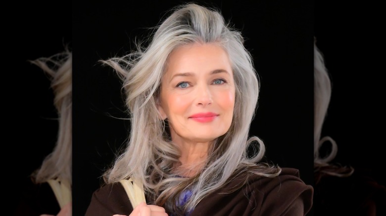 Paulina Porizkova was photographed walking outside CBS Studio in New York City in 2025 with her gray hair blowing in the wind as she clutched her purse.
