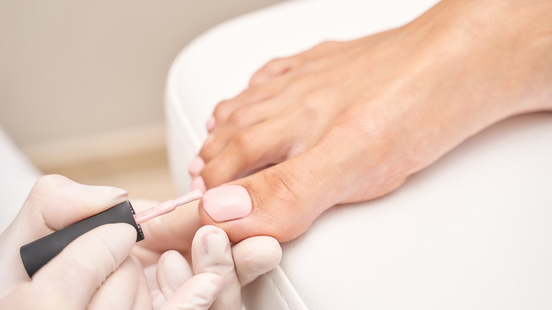 older woman getting a pedicure