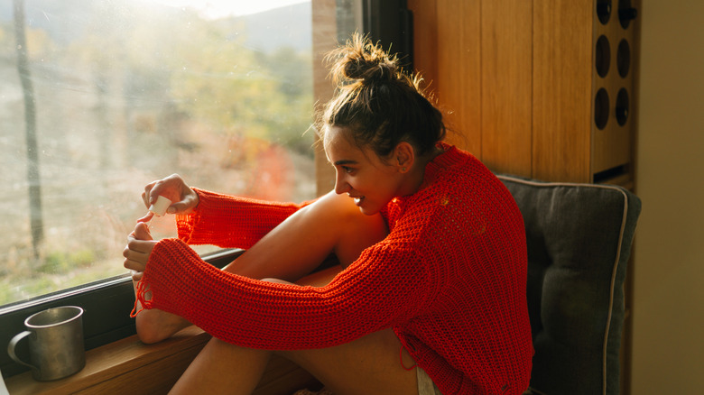 A woman doing a pedicure