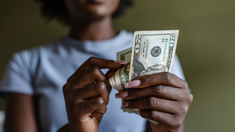 Woman counting money