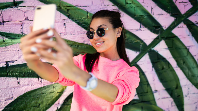 Woman taking selfie