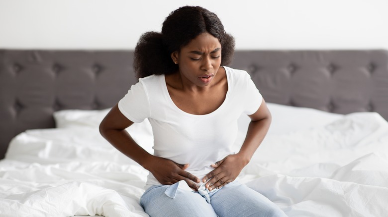 Woman experiencing period pain 