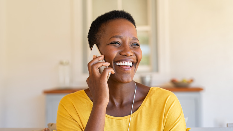 Smiling woman on phone 