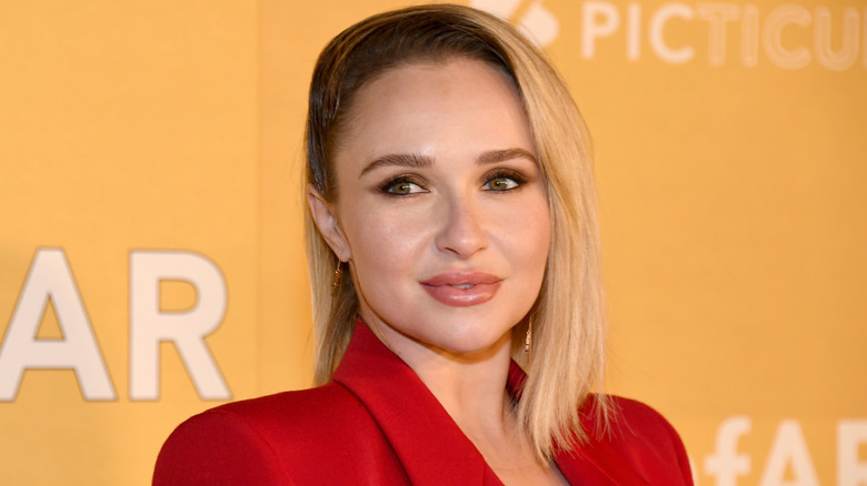 Hayden Panettiere with her hair slicked over to the side