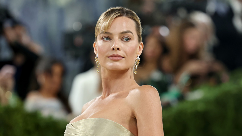 Margot Robbie with blond hair attending the 2026 Met Gala