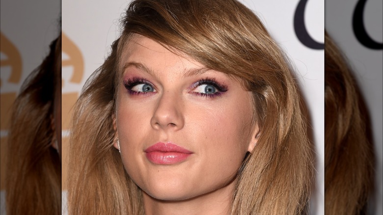 Taylor Swift with side swept bangs