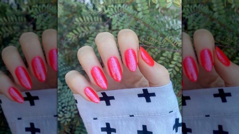 orangey-pink shimmery nails