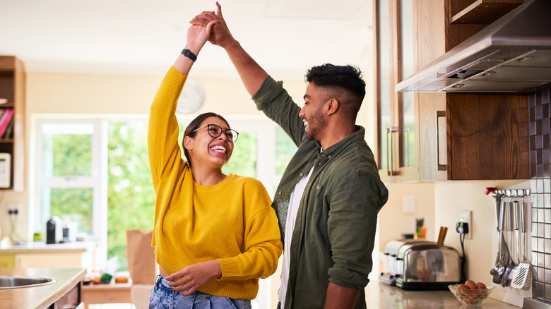 Couple dancing in the kitchen