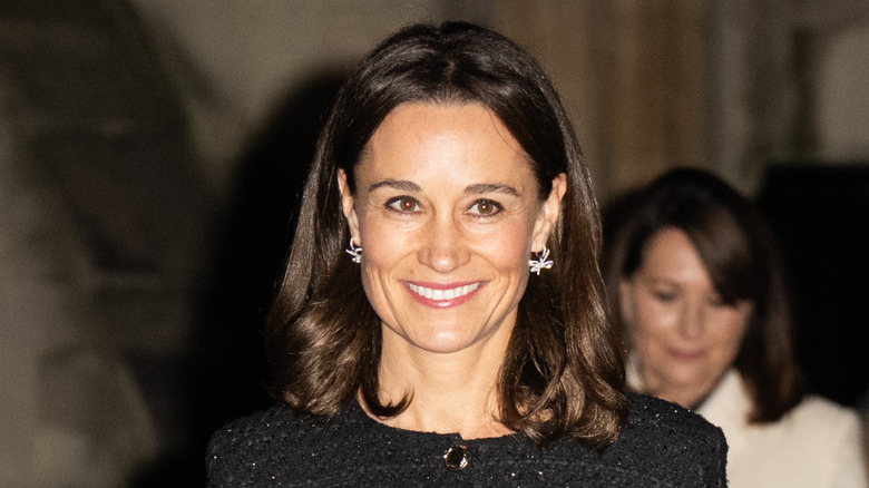 Pippa Middleton with a lob while wearing a dark coat