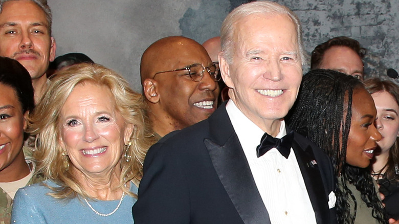 Jill Biden walking behind Joe Biden