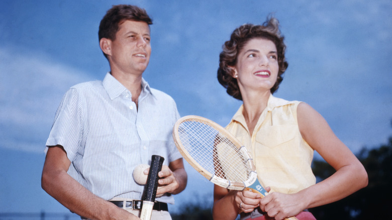 John F. Kennedy and Jackie Kennedy playing tennis