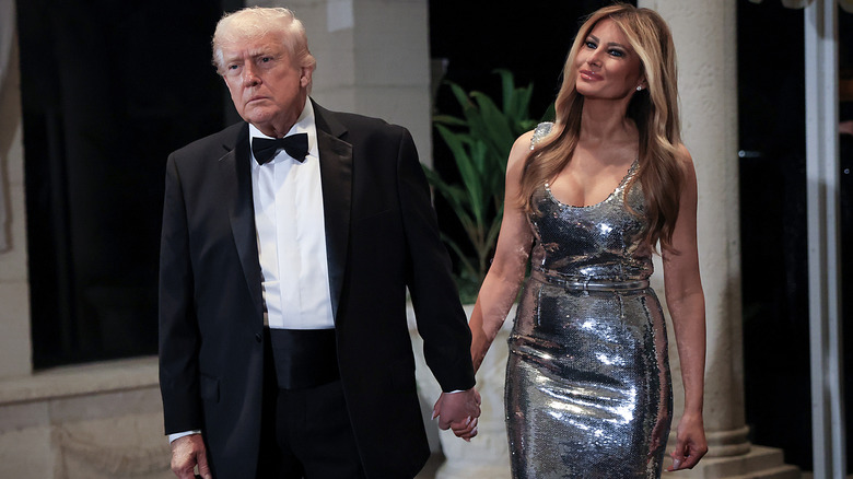 Donald and Melania Trump walking