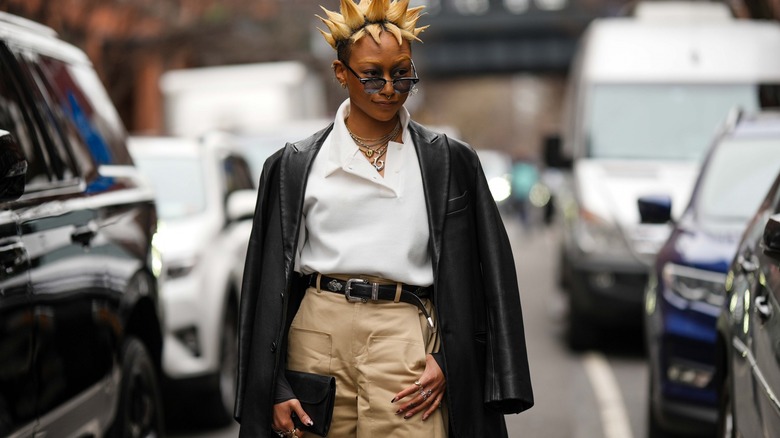 woman wearing white polo shirt