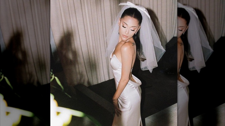Ariana Grande in her wedding dress and veil