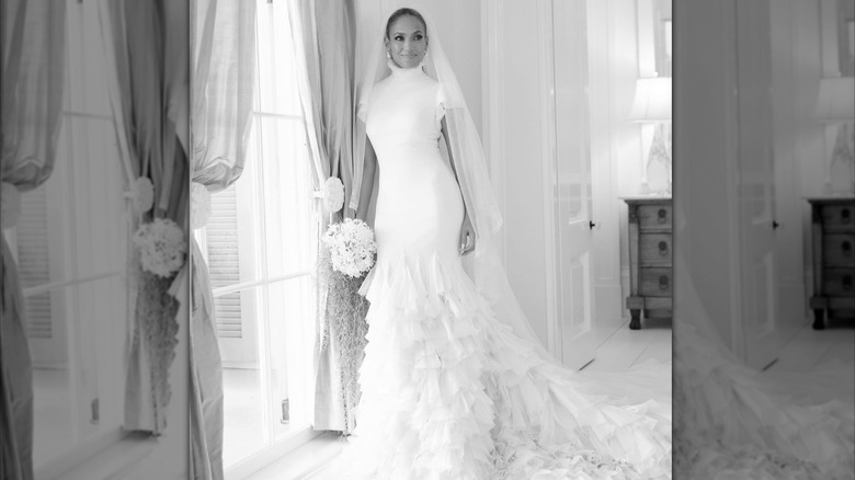 Jennifer Lopez wearing a Ralph Lauren wedding gown