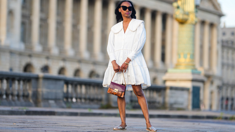 woman wearing a white poplin dress