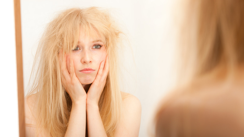 woman with blonde dry hair 