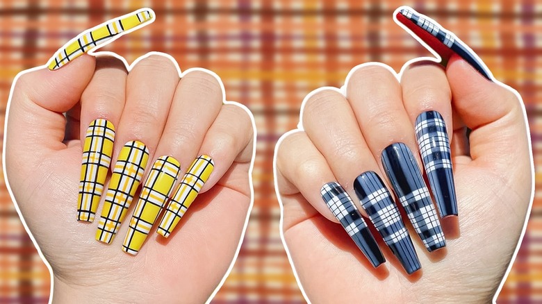 Two hands with plaid manicures