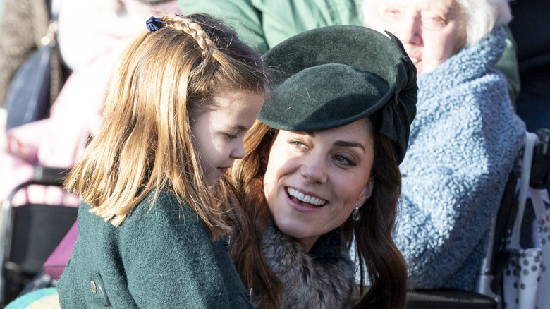 Princess Charlotte smiling with mom Kate Middleton
