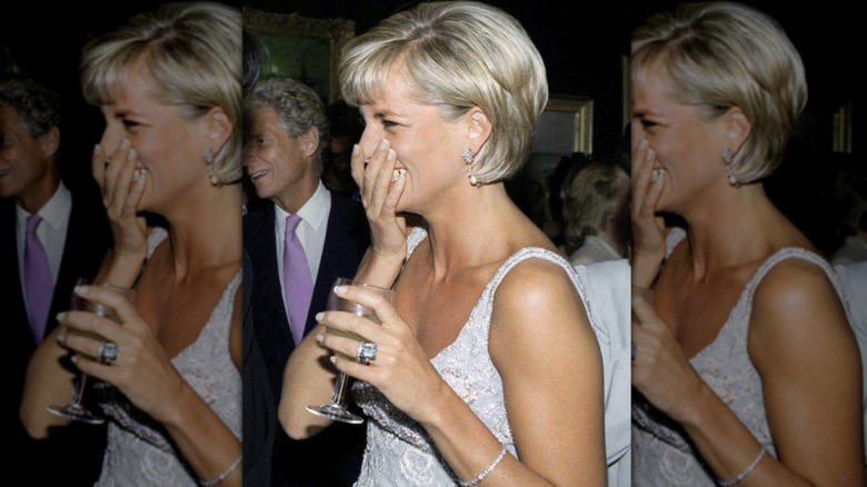 Princess Diana laughing with French tips